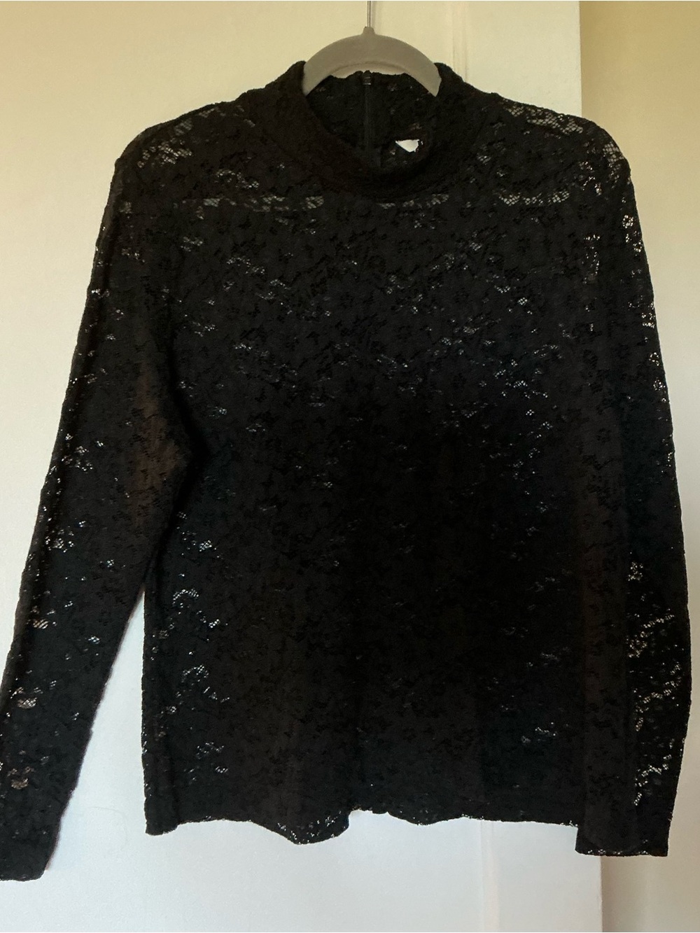 H&M black lacy blouse w/floral pattern.  Size XL.